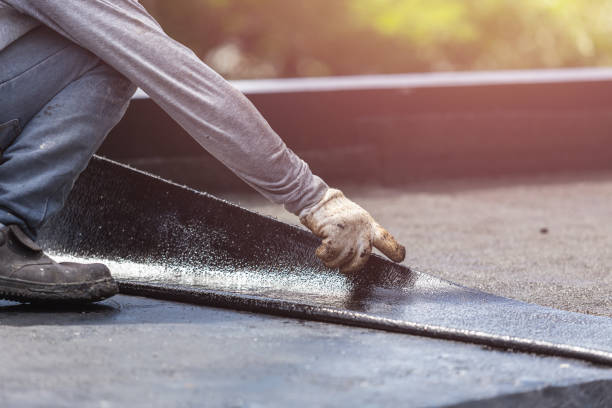 Professional Exterior Waterproofing technician working in Danville, VA